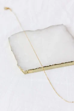 Exit Stage Left Necklace Gold