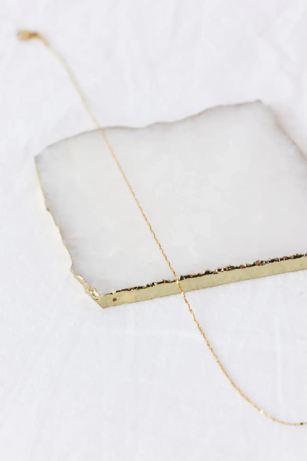 Exit Stage Left Necklace Gold